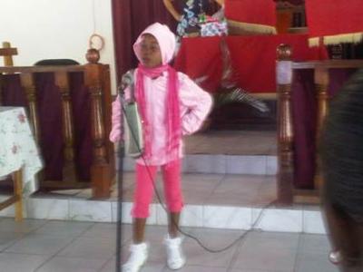 Karena Gayle reciting Chrismus Dung A Yaad