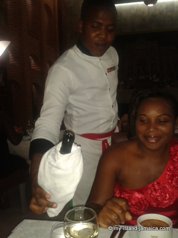 Mrs Gayle having champagne at rui Jamaica