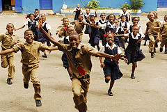 education_in_jamaica_school_children_running