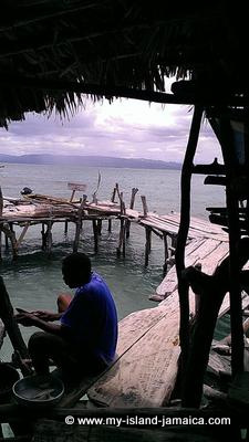 Cleaning fish for our lunch at Pelican Bar
