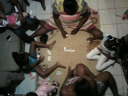 Jamaican Christmas- Playing Domino