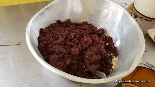 Grounded cocoa beans, ready to be turned into chocolate tea sticks or balls