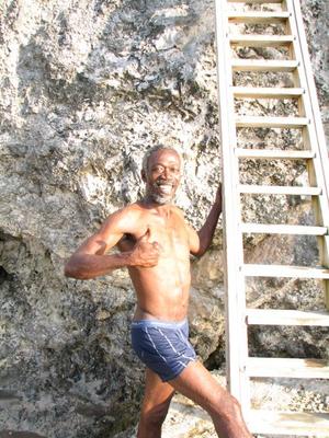 cliff diver at lighthouse Negril