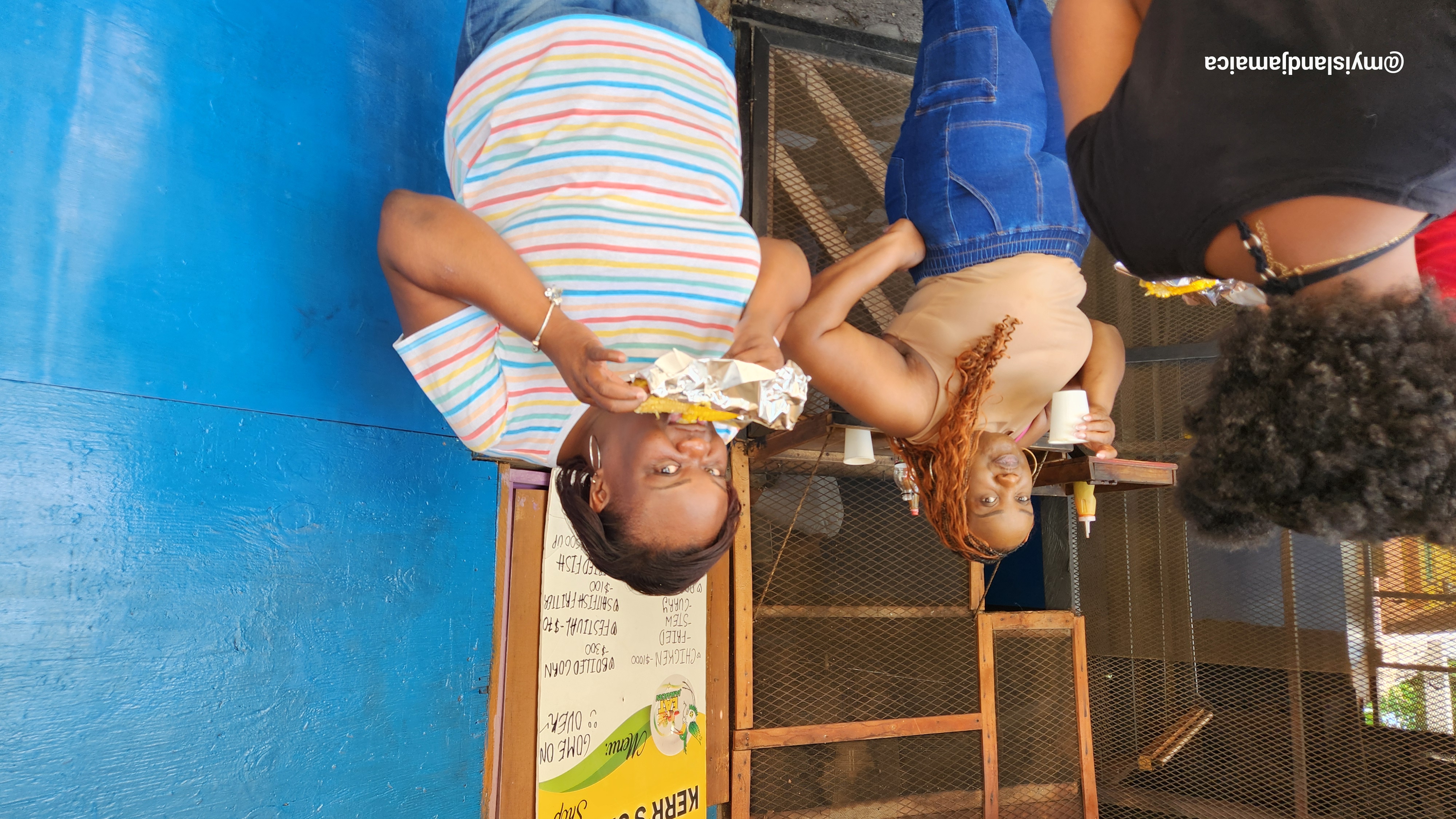 travel_budget_planner_for_jamaica_eating_roast_corn_and_soup_tanya_neka