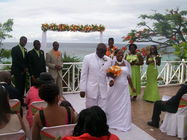 Wedding Ceremony - Bride and Groom Dancing Down