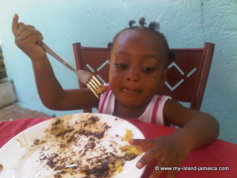 aliana_gayle_enjoying_her_jamaican_food_at_wag_water_valley_mothers_day_brunch