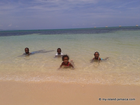 kids swimming at dead end beach in montego bay