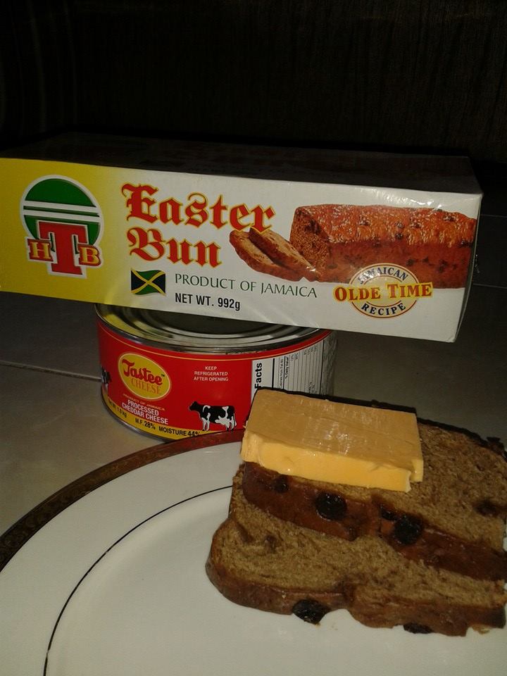 jamaican easter bun eating with cheese