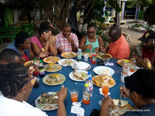 Family Having Dinner in Jamaica